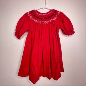 red smocked bishop dress